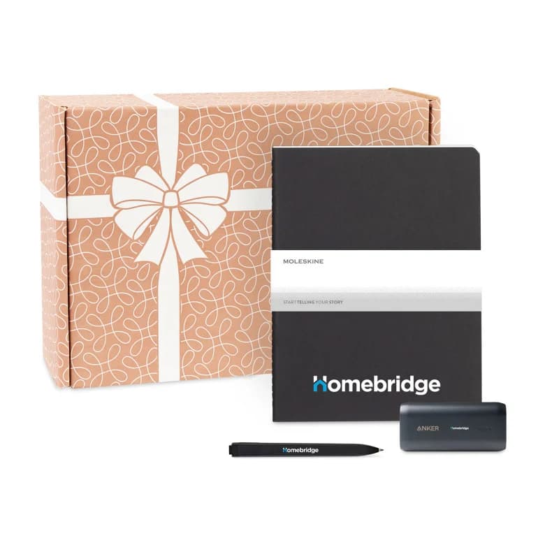 Co-branded Moleskine kit with pen and power bank.