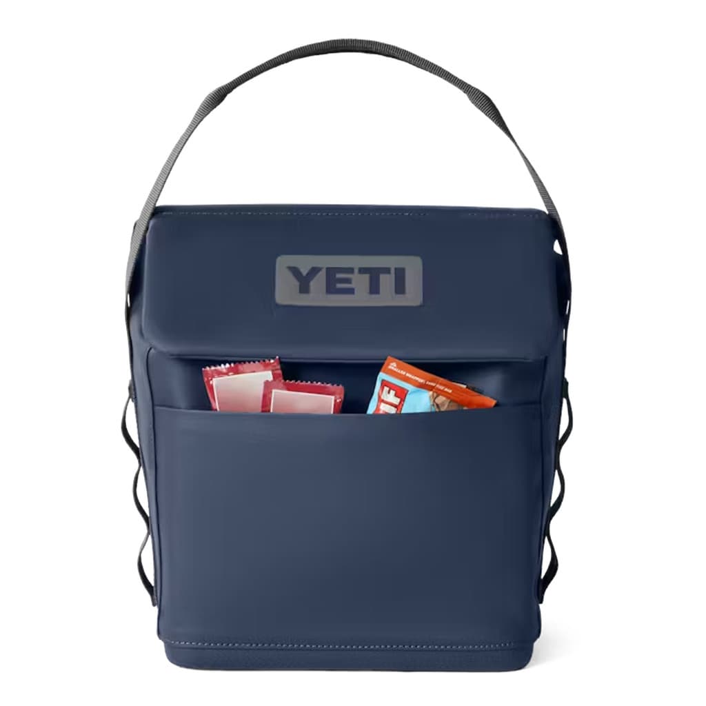 Navy YETI cooler with snack pouch.
