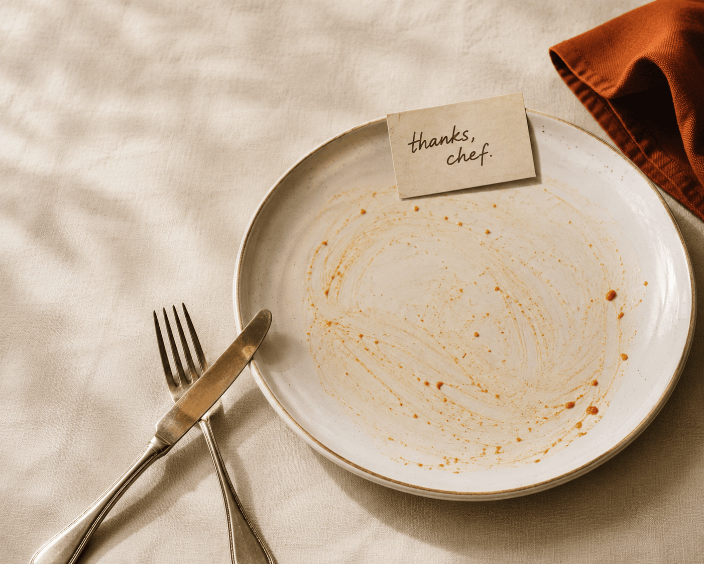 An empty restaurant plate, finished. The kitchen's promise.